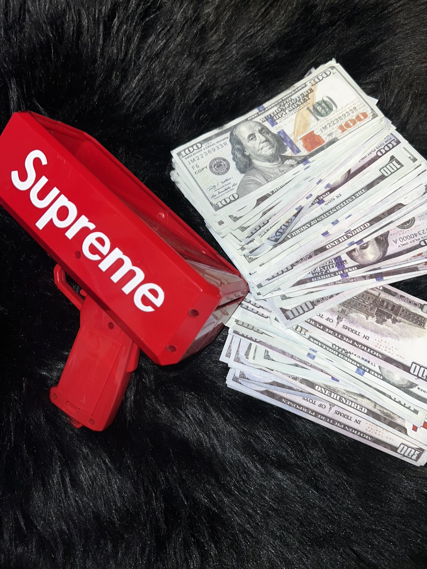 Supreme Money Gun