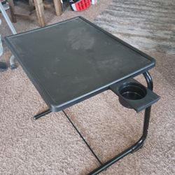 Tv tray/ adjustable desk has 6 heights 3 tilts and a cup holder asking only $40 cash must pick up Broadway and apache buckeye AZ