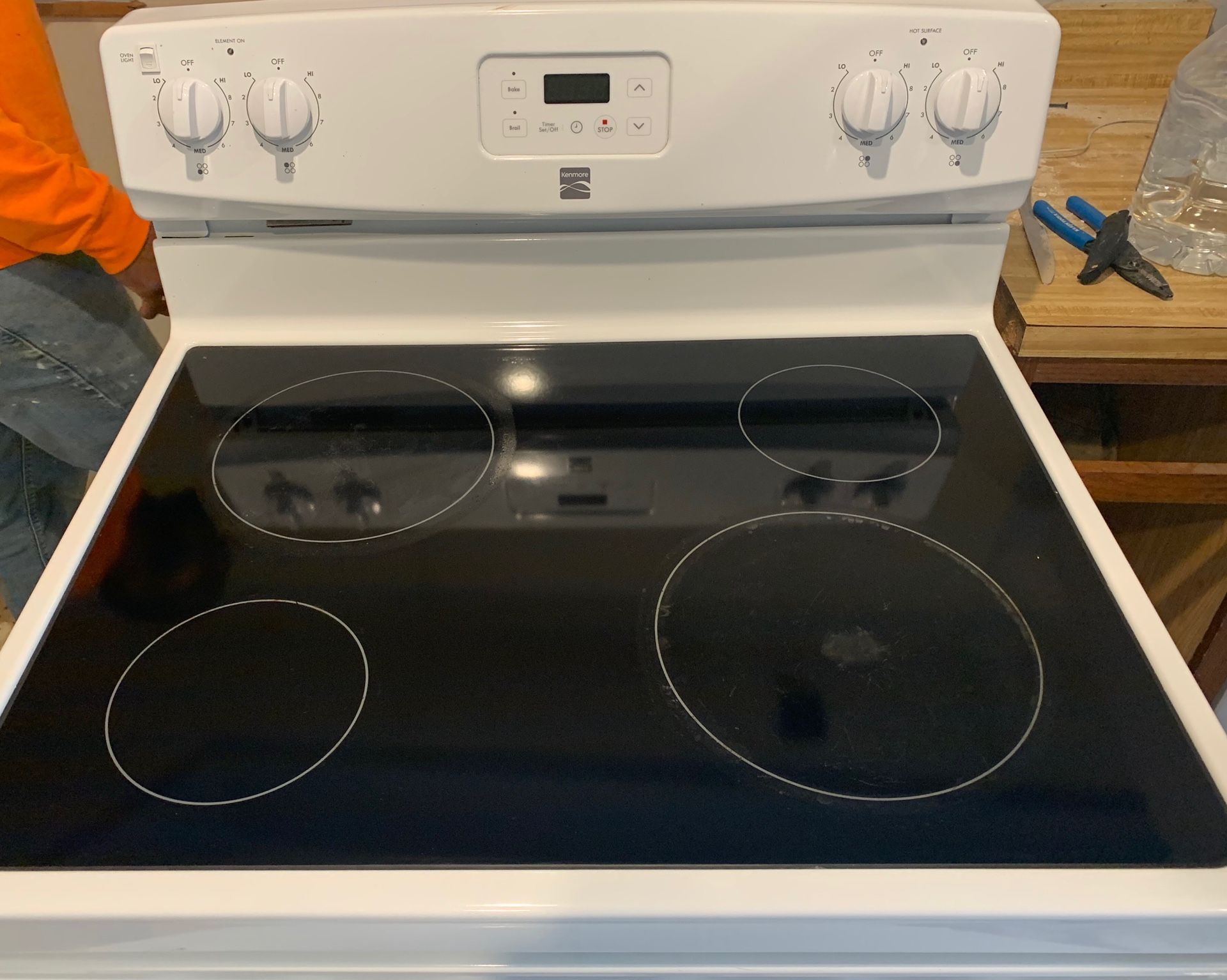 Used Kenmore kitchen fan , stove and fridge