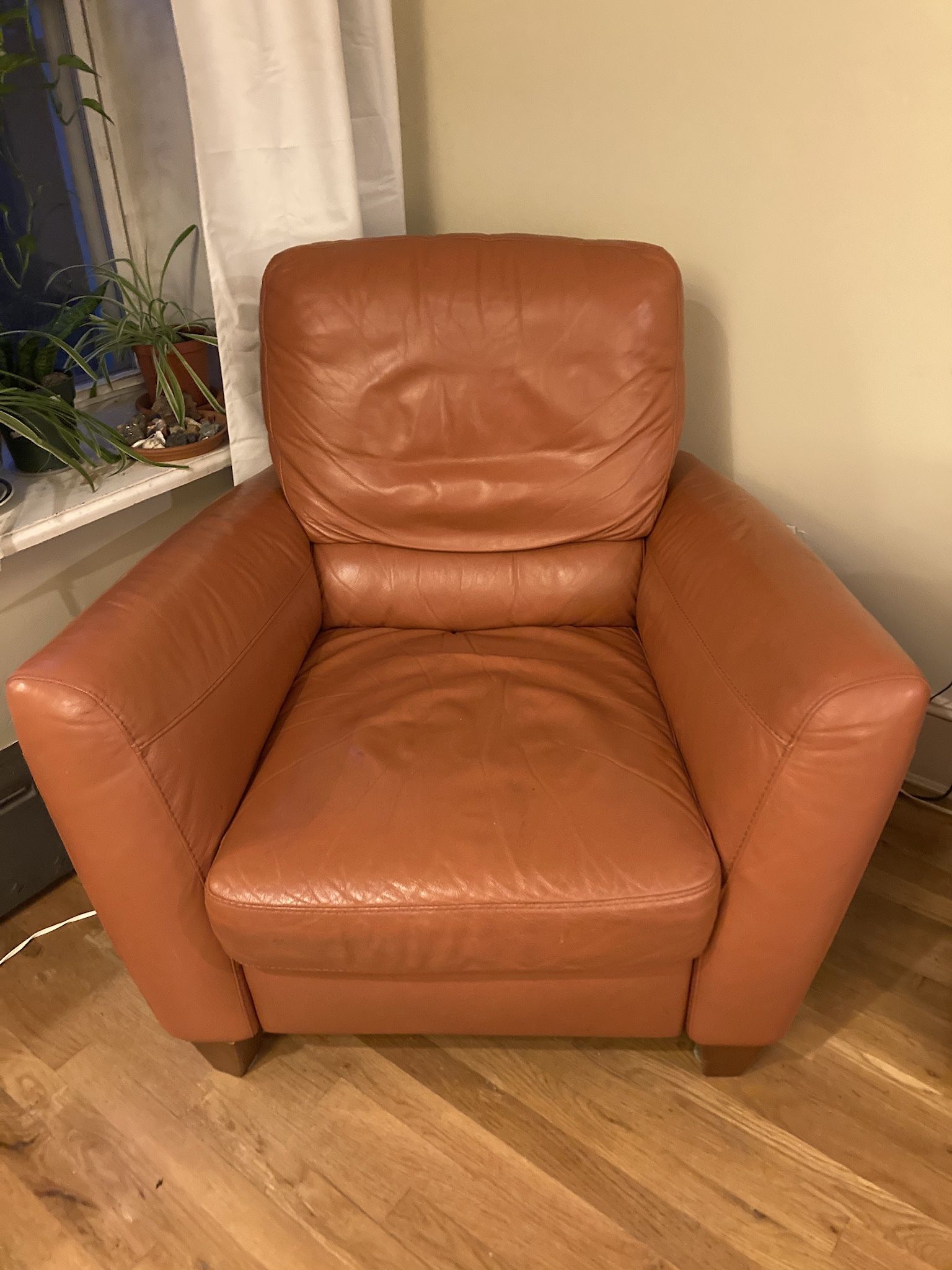 Natuzzi Italian Leather Orange Recliner