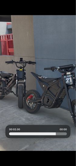 BIKE ON LEFT ONLY!! comes with gut seat cover and odi decal