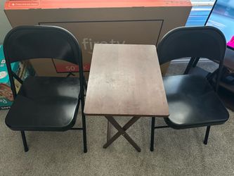 1 small folding wooden tea table and 2 folding metal chairs