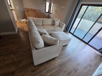 New 99x99 off white sectional couch with ottoman / free delivery