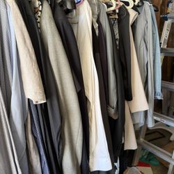 Rack Of Clothing Men’s And Women’s Some Designer 