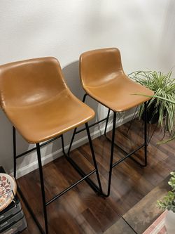2 faux leather bar stools