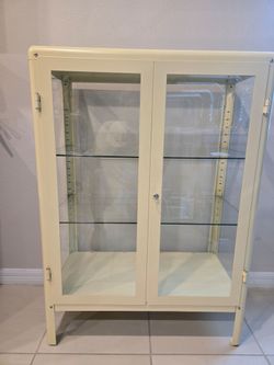 Glass cabinet with doors