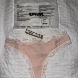 Skims new cotton lace thong 