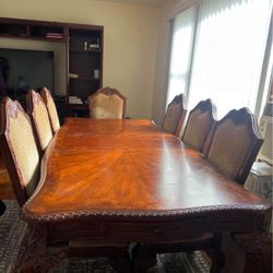 WOOD DINING TABLE SITS 8