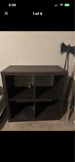 Wooden shelf with storage space