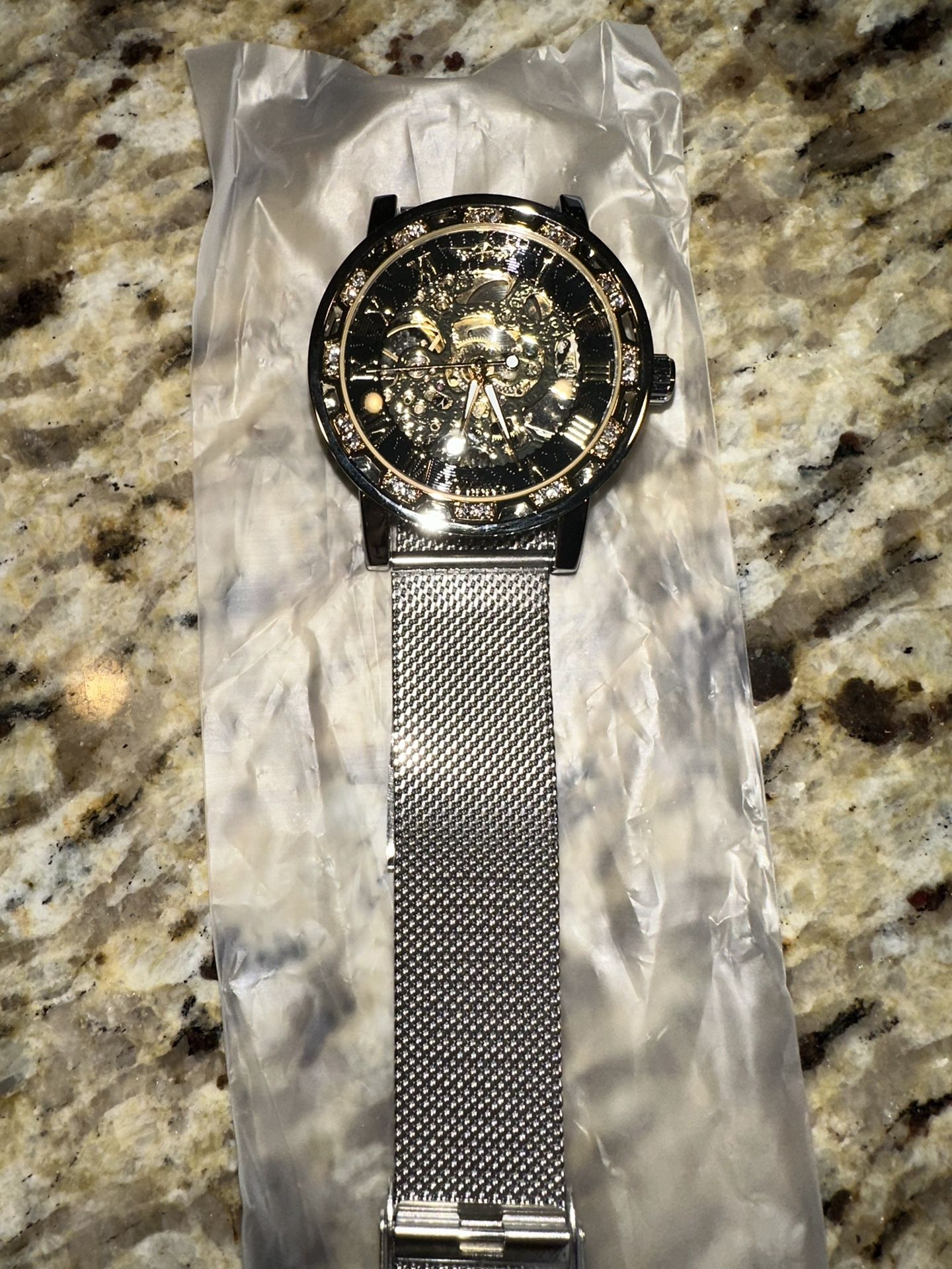 Black And Gold Faced Watch
