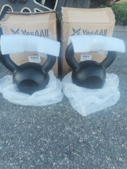 NEW PAIR KETLLE BELLS