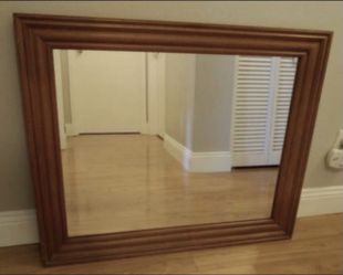 Nice wood frame mirror for sale for $10.00