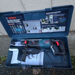 BOSCH ROTARY HAMMER NEW WITH CASE 
