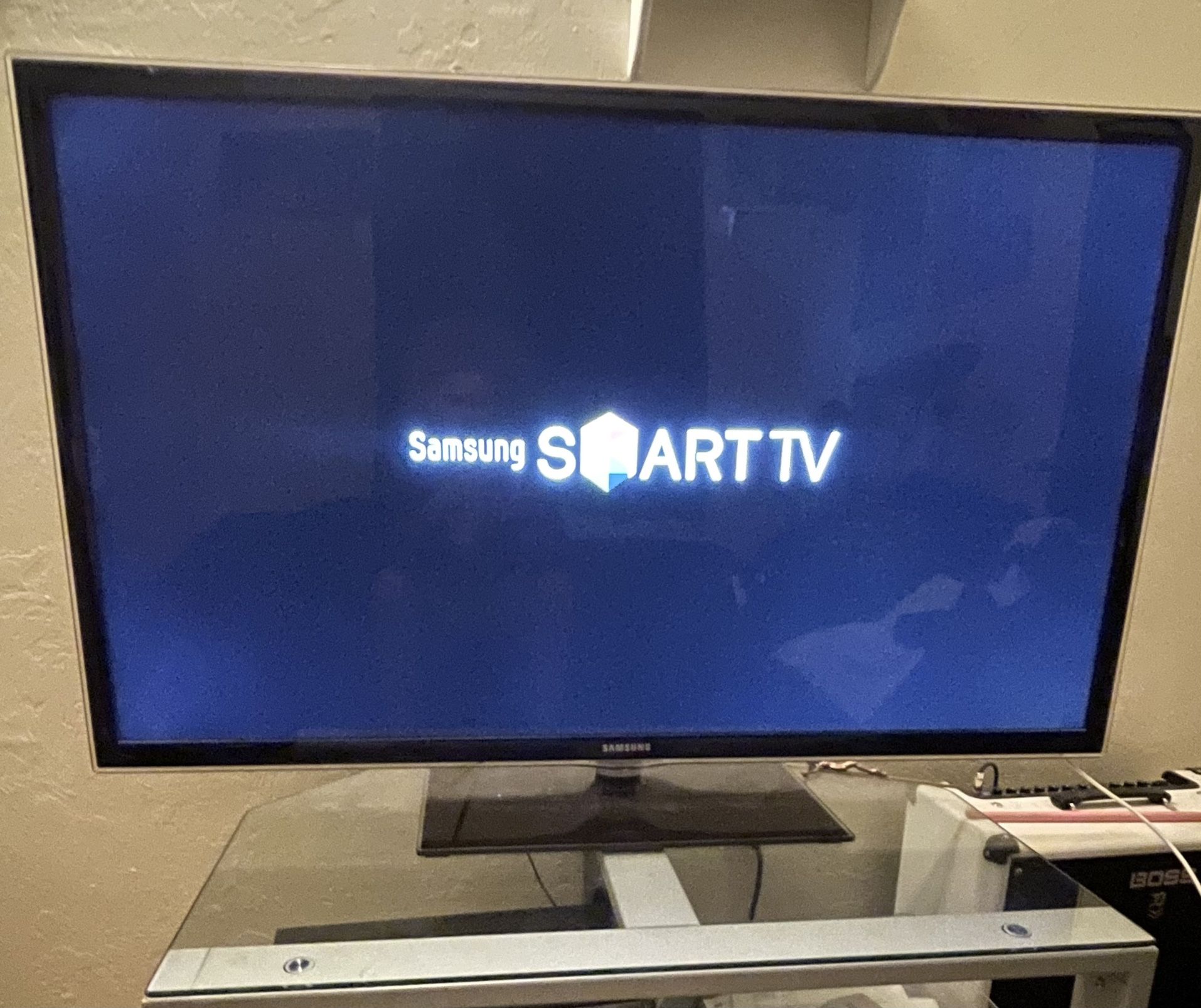 55 inch Samsung Smart TV w/ Glass stand