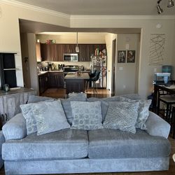 Ashley Furniture Gray Sofa And Oversized Armchair