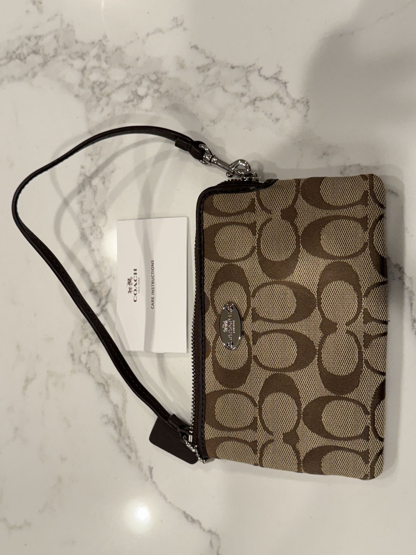 COACH Corner Zip Wristlet