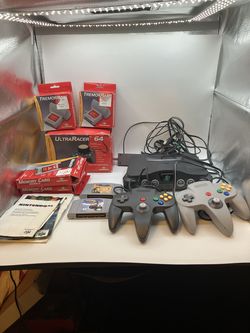 Nintendo 64 console controllers OEM two games manuals and extras