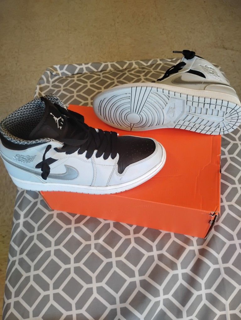 Nike Air Jordan 1 Retro Mid "Wolf Grey" sneakers.