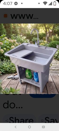 freestanding plastic utility and laundry sink in gray, equipped with an integrated washboard and lower storage shelf.
https://offerup.com/redirect/?o=