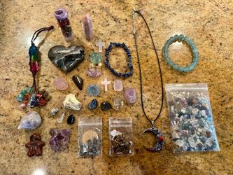All for $25, Assorted crystals including a sunstone tower, heart, carvings, tumbles, chips, 2 bracelets, red Jasper moon pendant necklace