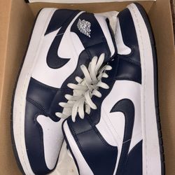 Navy/white Jordan 1 Mids 