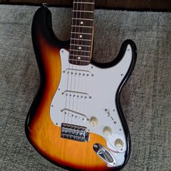 Squier by Fender Vintage Modified Electric Guitar - Sunburst With Strap And Gigbag
