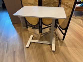 Over bed table adjustable height