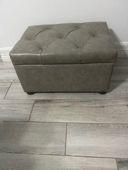 Gray Tufted Faux Leather Storage Ottoman