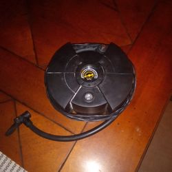 12 Volt Tire Pump Plugs Into The Cigarette Lighter