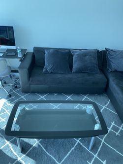 2 piece Sofa/w cushions , rug , coffee table for 300$