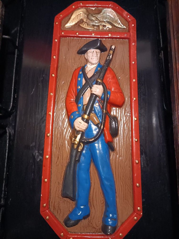 Chalkware wall plaque.