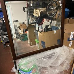 Gently used mirrored headboard