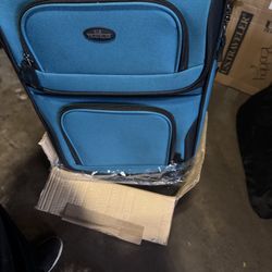 2 Luggage Bags.   60$ For Both 