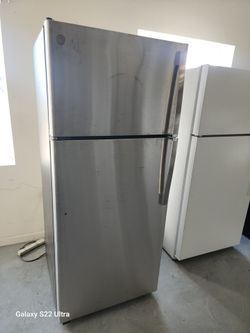 Used stainless steel refrigerator 18 cubic feet plugged up cold and clean 30 days warranty cash only