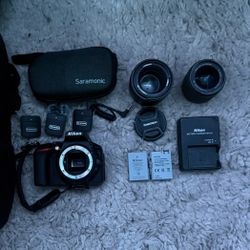Nikon D5600 DSLR w/2 lenses, 2 batteries, charger, Saramonic mic set, and bag