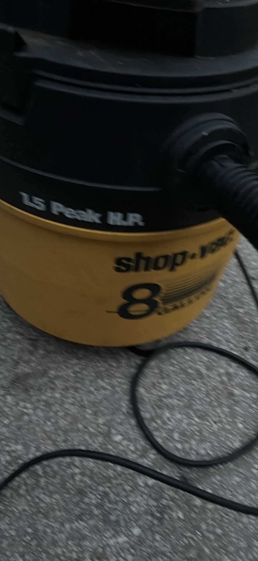 Wet dry vacuum- 8 gallons, 1.5Peak HP, 4 wheels. Location π