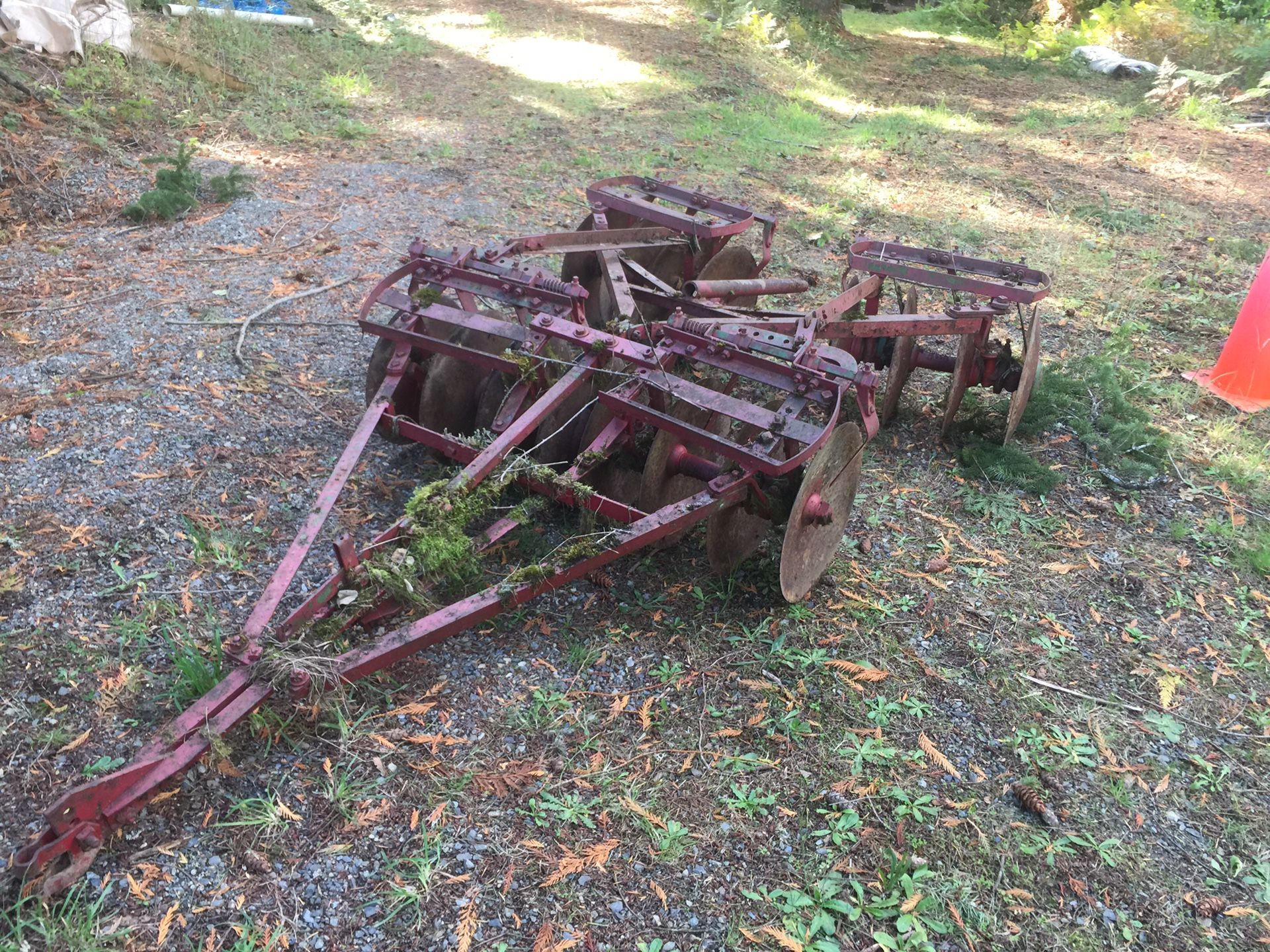 Old tiller used with Farmall tractor