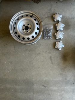 4  Factory Steel Wheels 17”x7” + Center caps