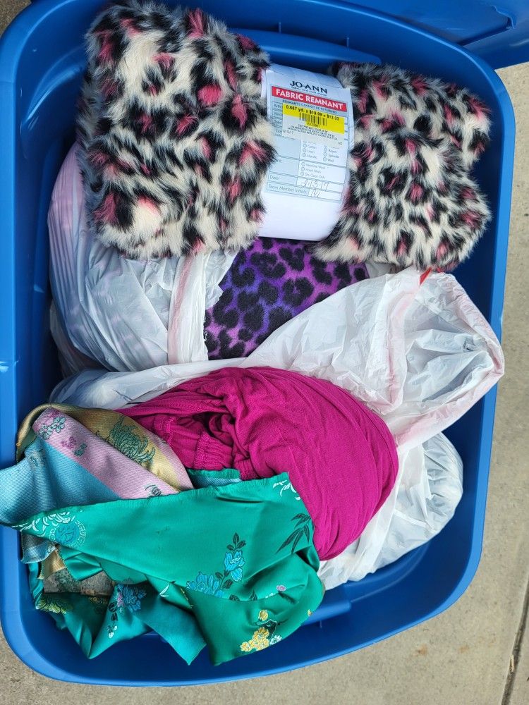 Bin Of Fabrics And Other Cloth Items