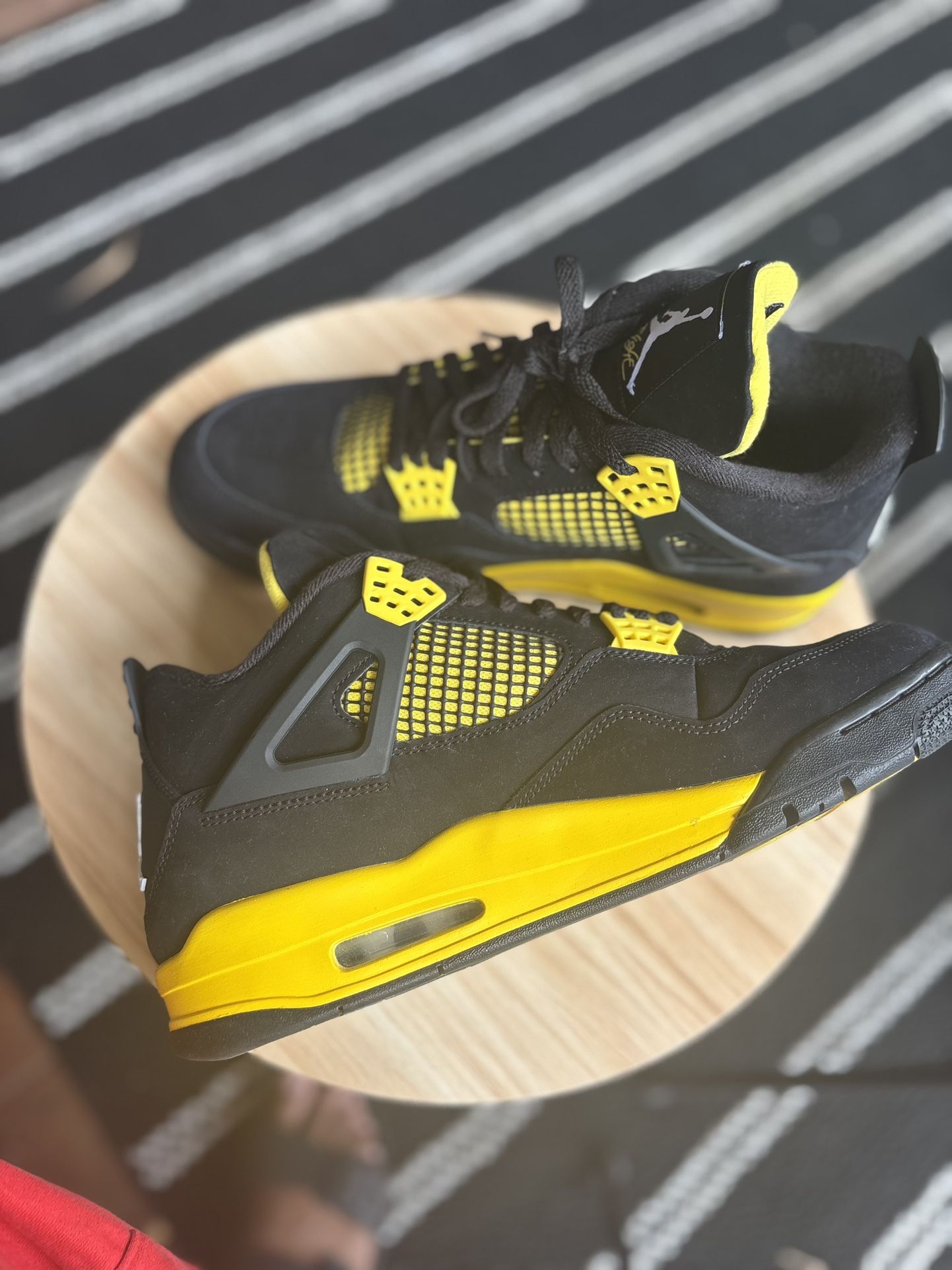 Jordan 4 Retro “Thunder”