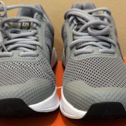 Nike brand shoes, size 10.5, in gray color,