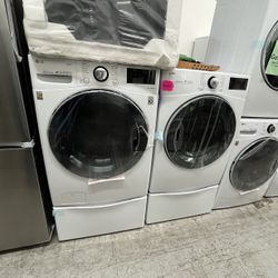 LG FRONT LOAD WASHER & DRYER WITH PEDESTALS