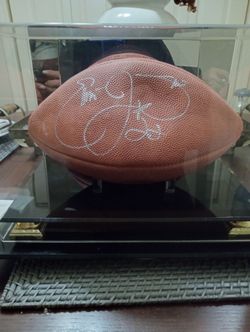 Emmett. Smith signed football in display case with J S.A. letter of authenticity,
