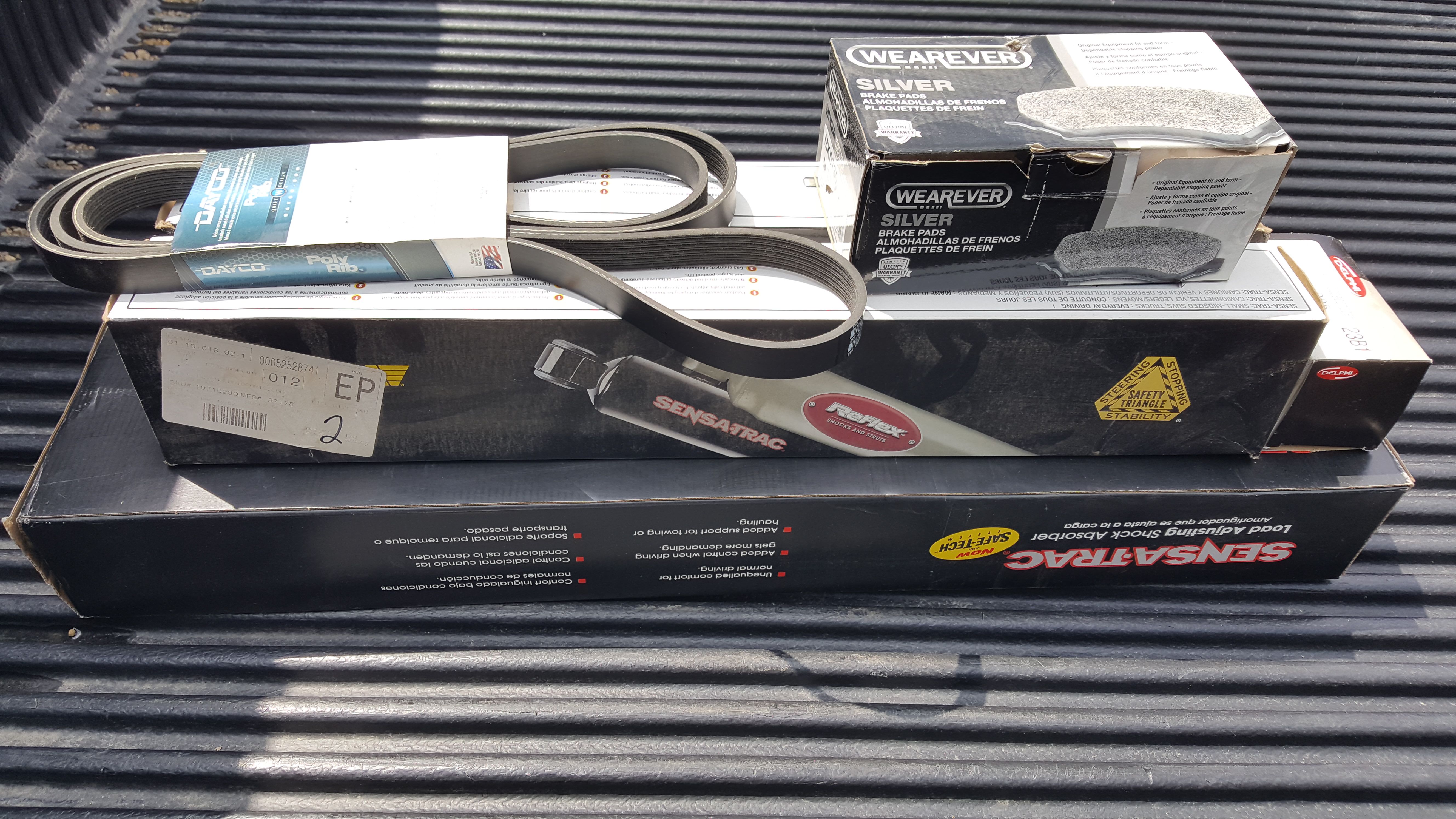 2 pair of truck shocks and belt