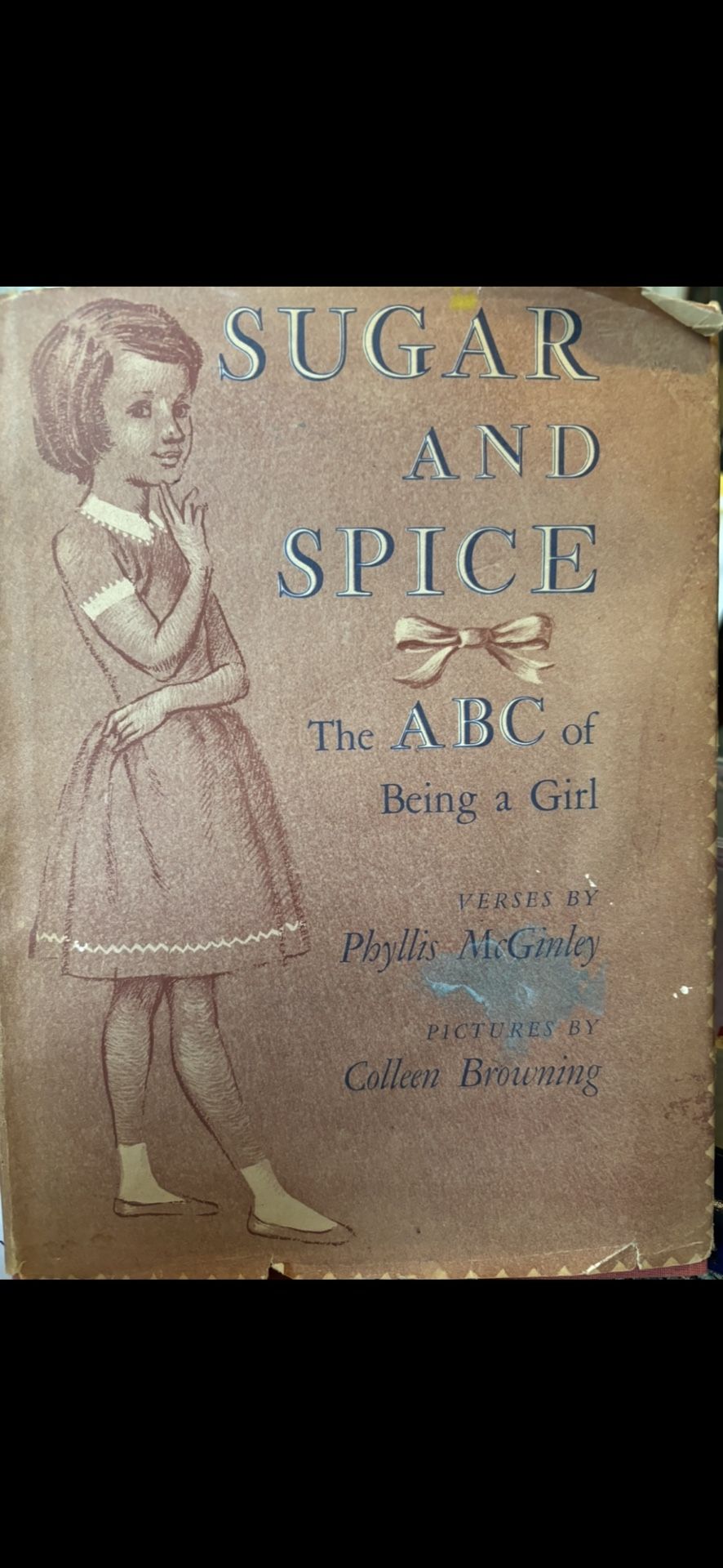 Sugar and Spice: The ABC of Being a Girl by Phyllis McGinley.