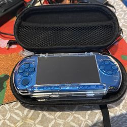 Sony psp 3000 model games and videos plus 4batterys