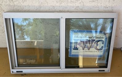 (1) Double glass window, aluminum, block, 30in (w) x 18in (tall)