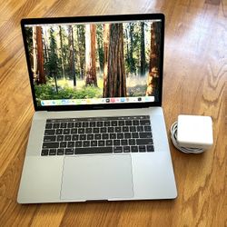 15 inches Apple Macbook Pro 2018 Touchbar Laptop macOS Sequoia i7 6-Cores @2.2Ghz 16Gb 256Gb Dual GPU Radeon Pro  Microsoft Office Final Cut Logic Pro
