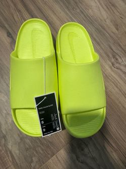 Brand new ,Nike calm slides volt, men size us 8