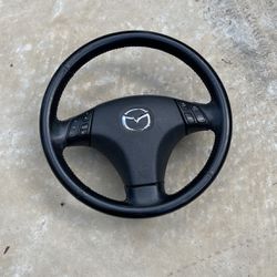 Mazda Steering Wheel W/controls